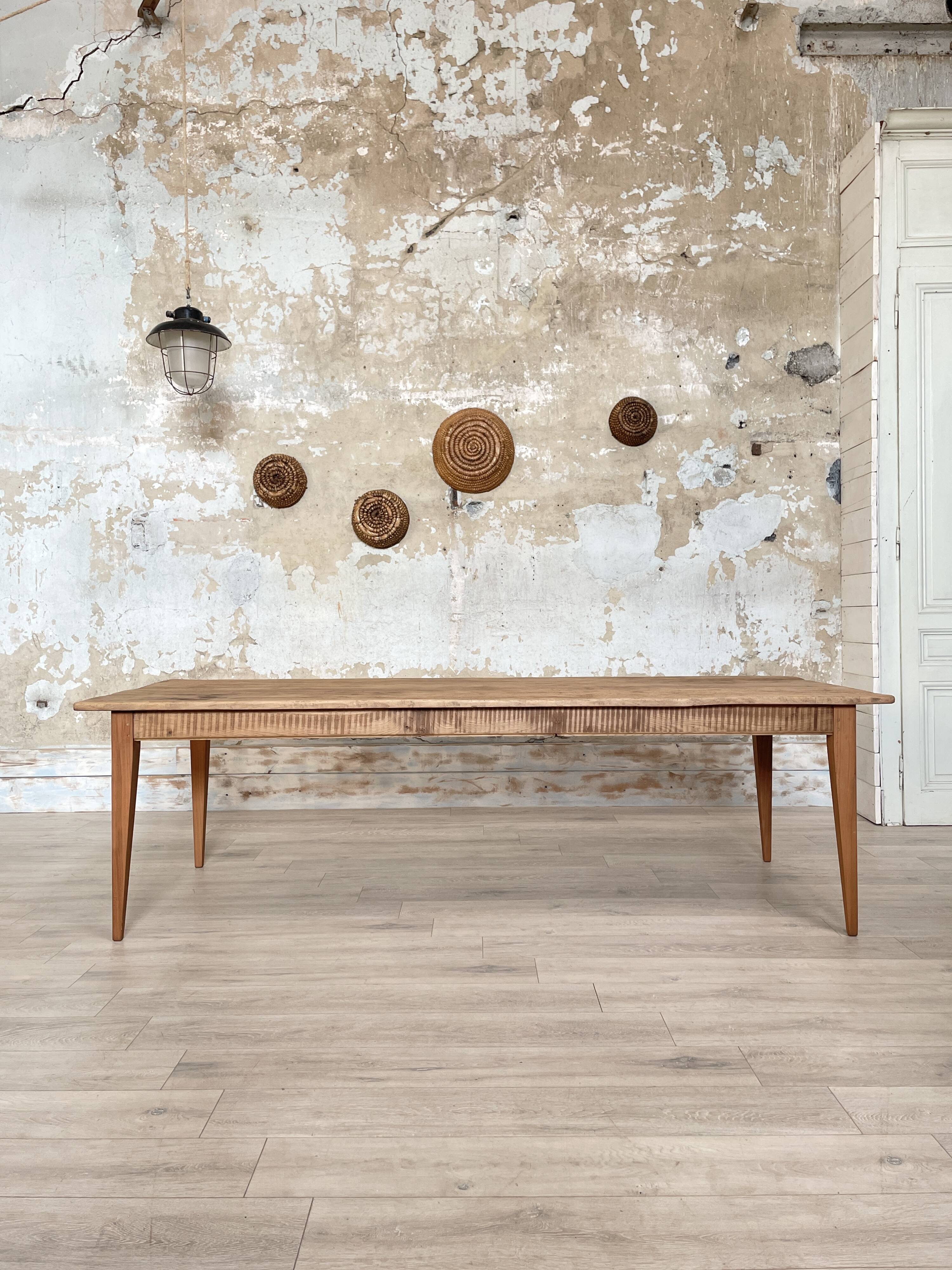 Vintage farm table with spindle legs.