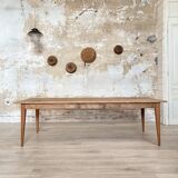 Vintage farm table with spindle legs.