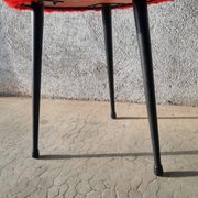 Tripod stool with vintage red moumoute seat