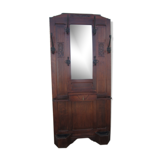 Vestiaire wears hat coat and art deco umbrella in wrought iron patere wood