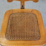 Antique late 19th century English office chair with reclining backrest and height adjustable