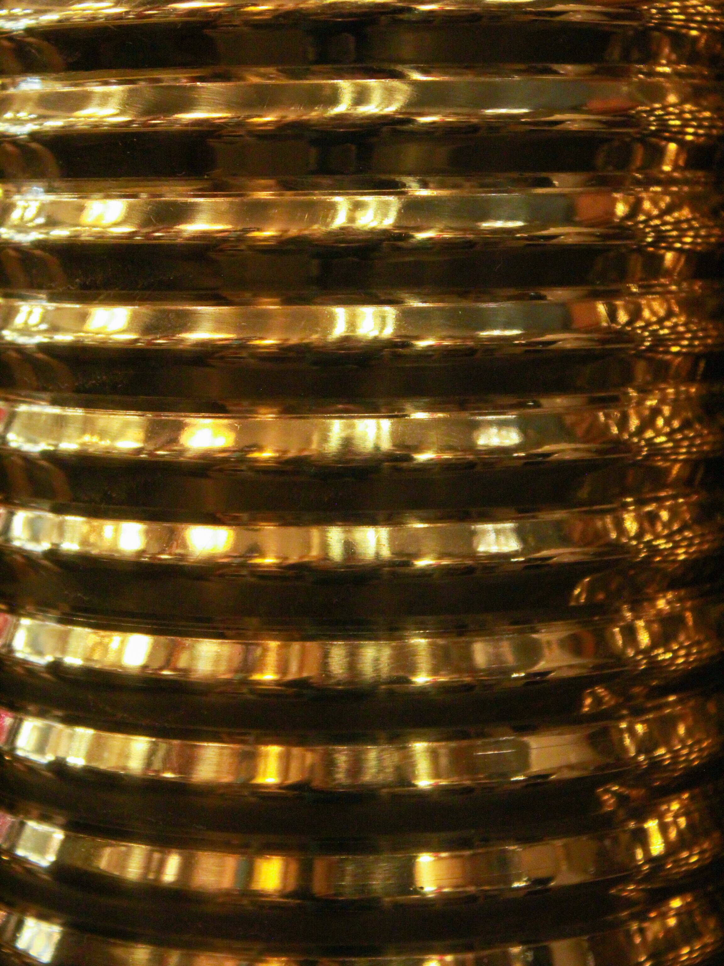 Pair of lamps in gilded brass