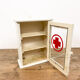 Vintage medicine cabinet red cross glass door