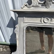 Large decorative mirror in carved wood with shabby patina