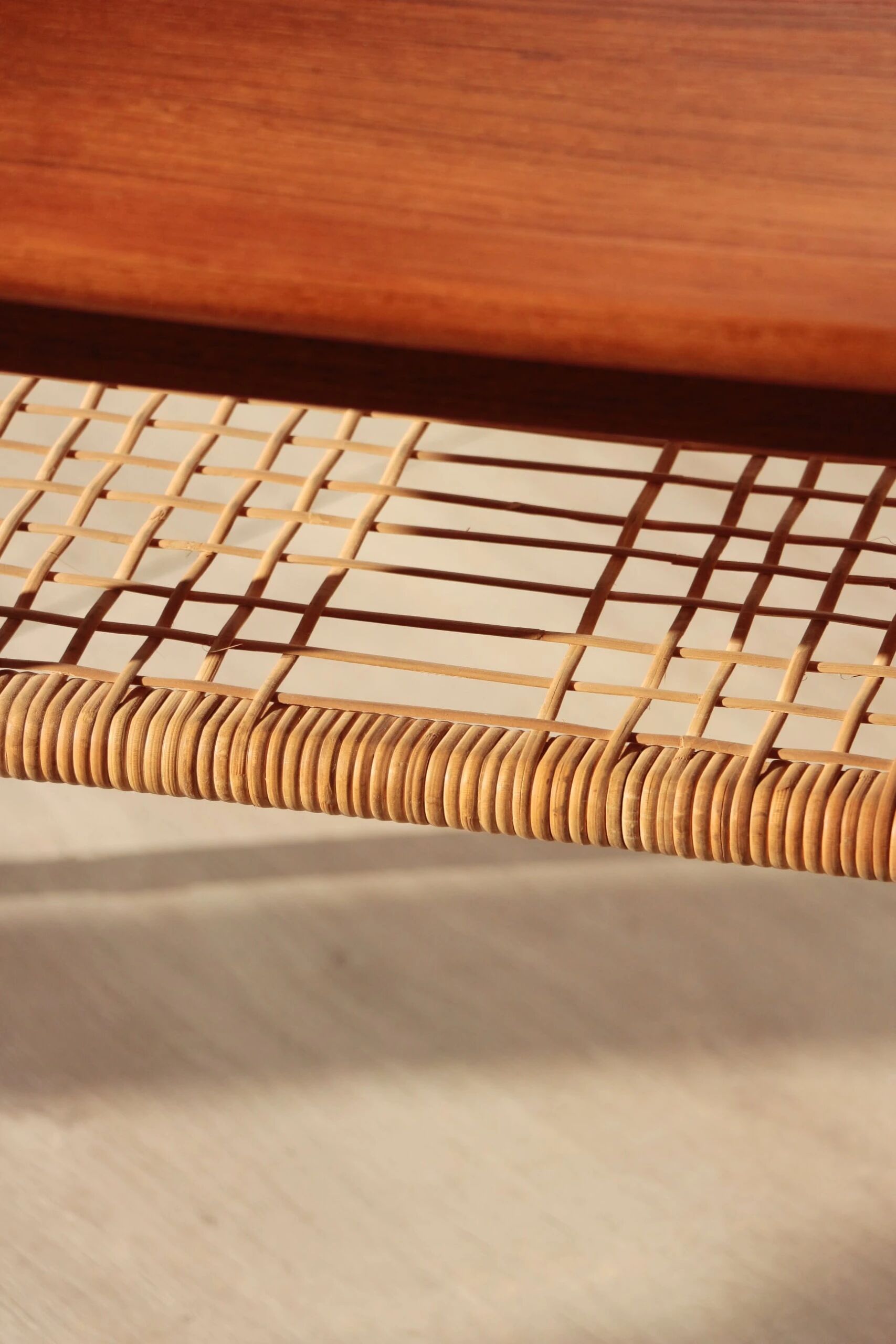 Vintage Scandinavian coffee table in teak and rattan – Danish design from the 1960s.