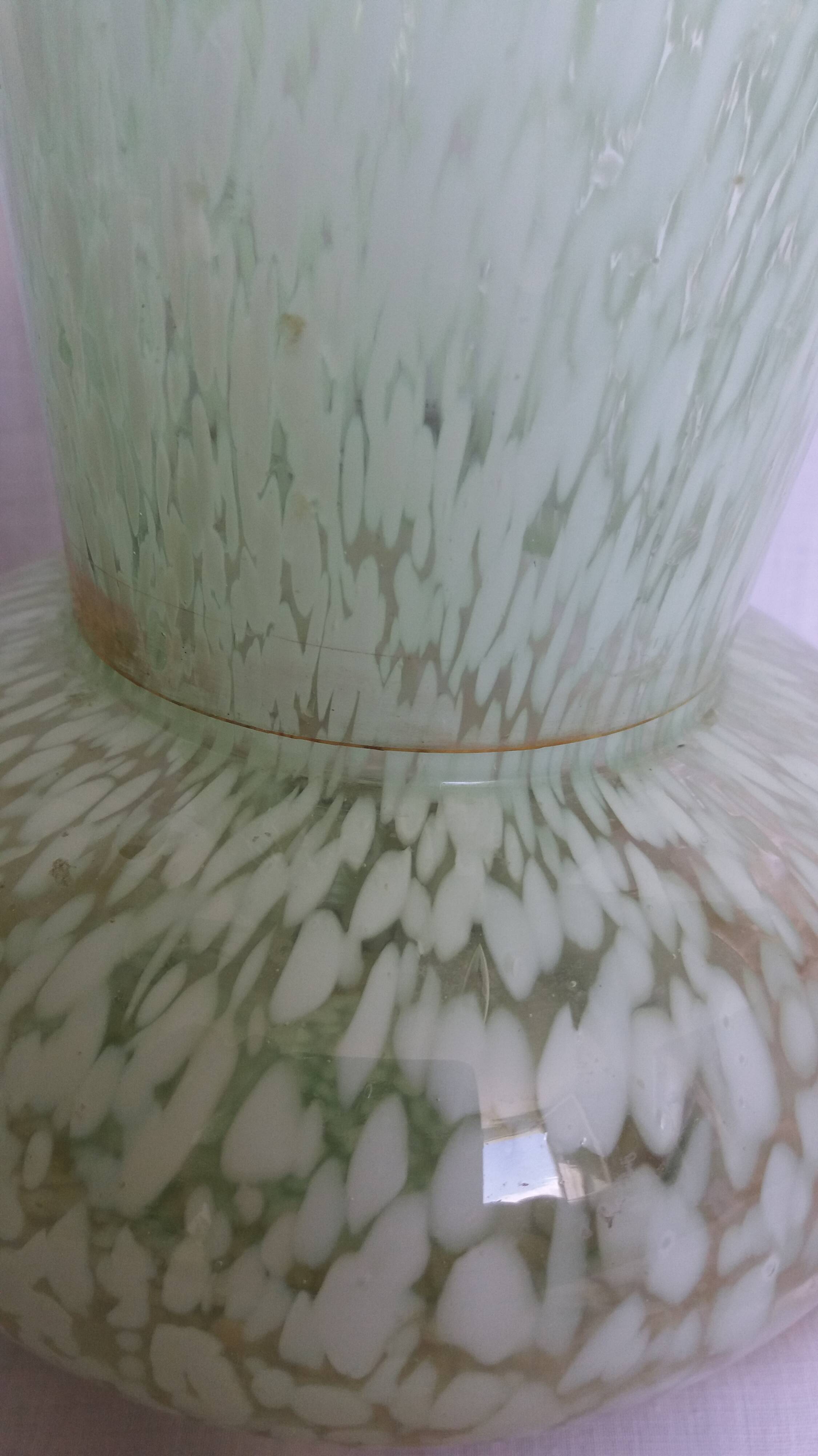 Green speckled glass vase from Clichy with gold threads.