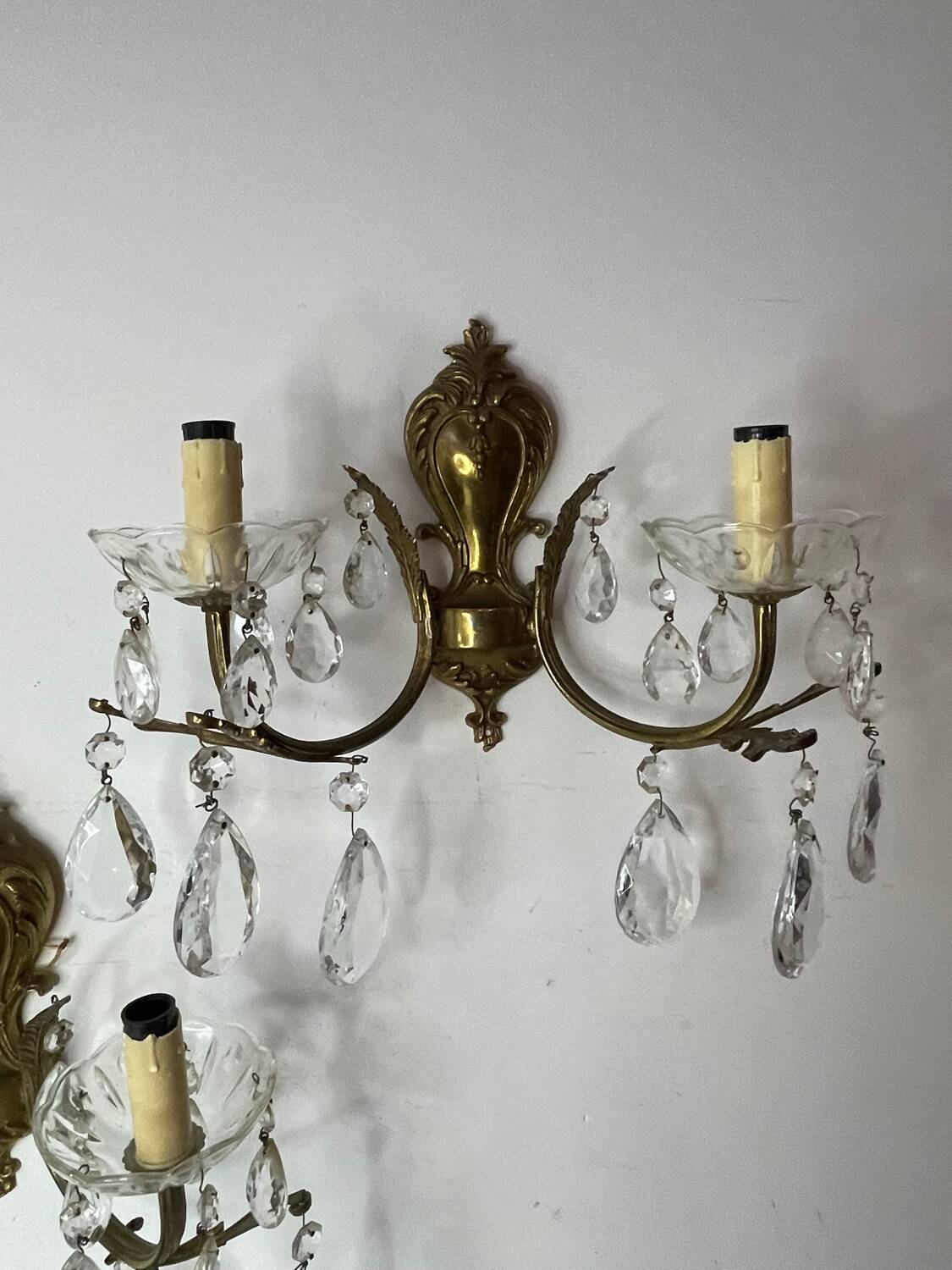 Pair of bronze and crystal wall lights