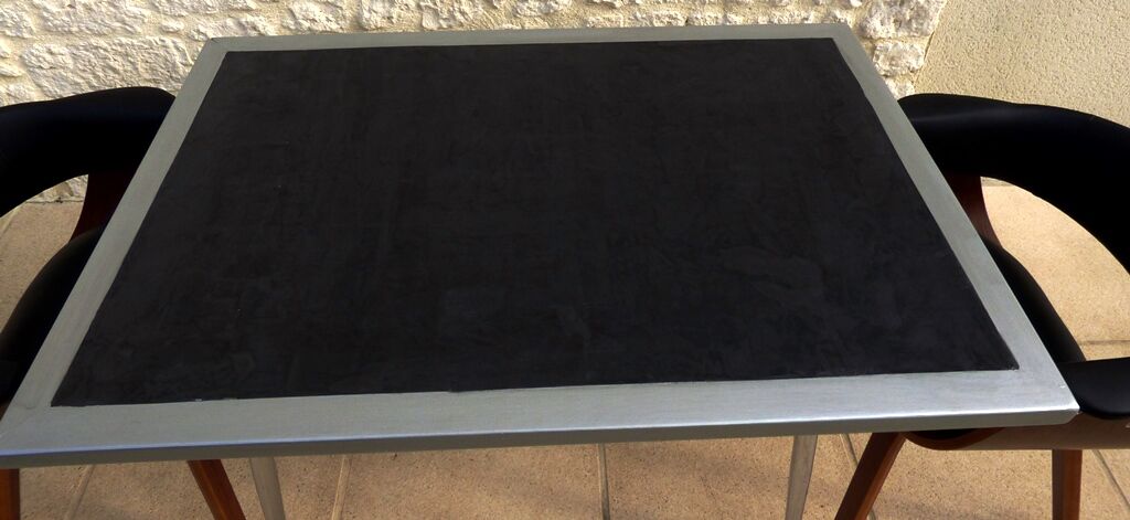 *Table with concrete top and industrial style stainless steel contour