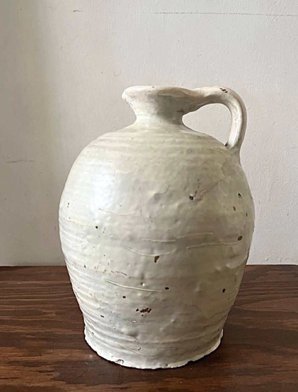 Wabi-sabi amphora vase in off-white and glazed, France circa 1970.