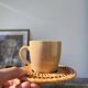 Ceramic and rattan coffee cups