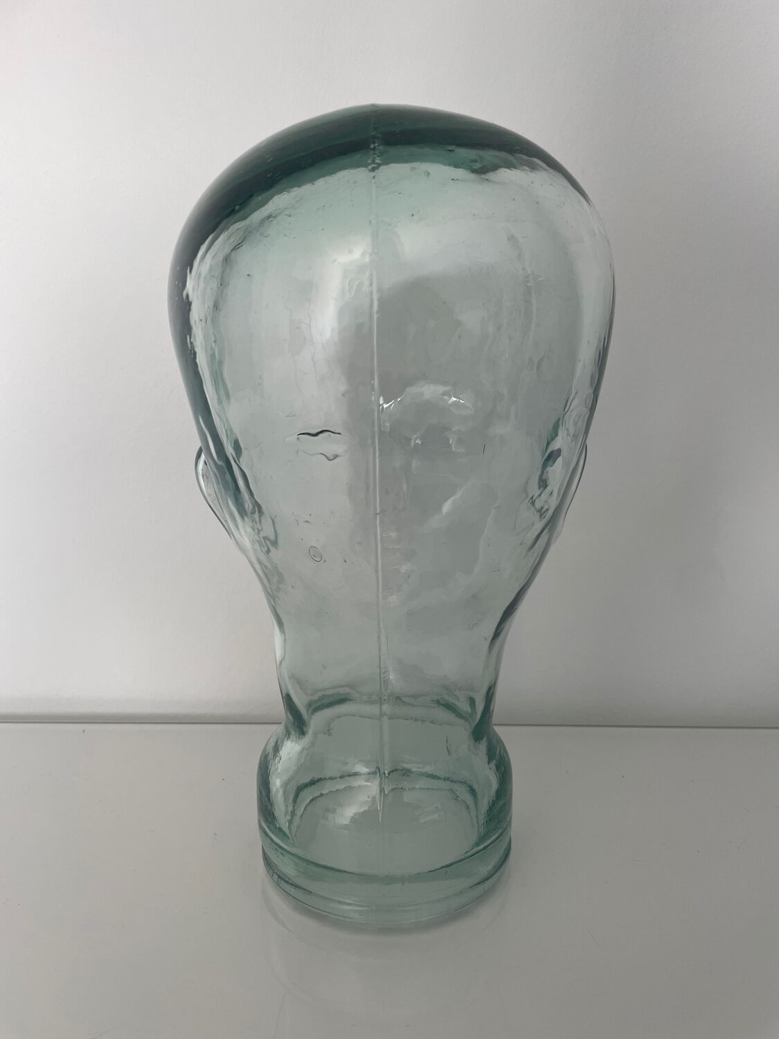 Mannequin head with glass hat