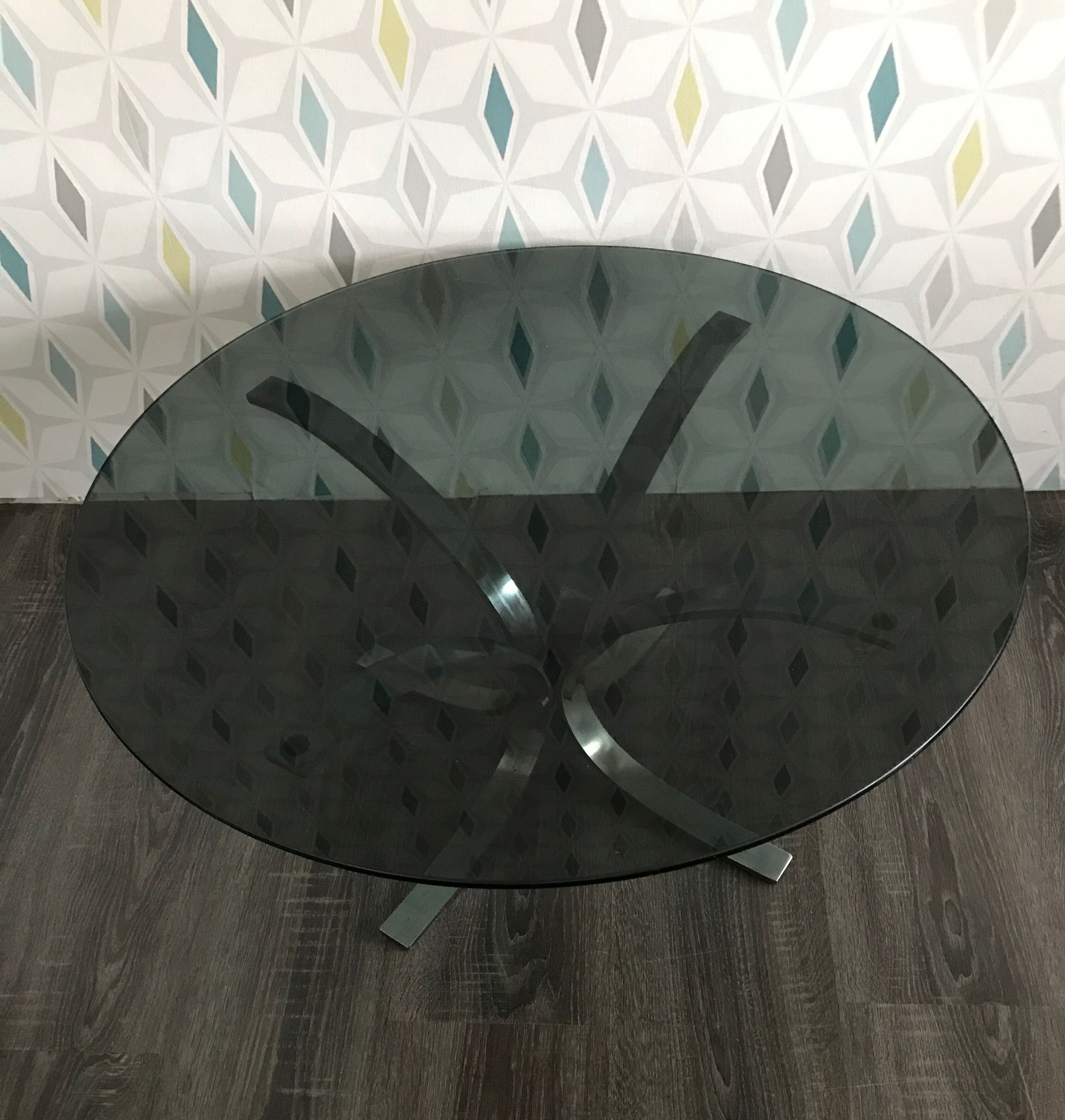 Vintage glass coffee table and chrome foot