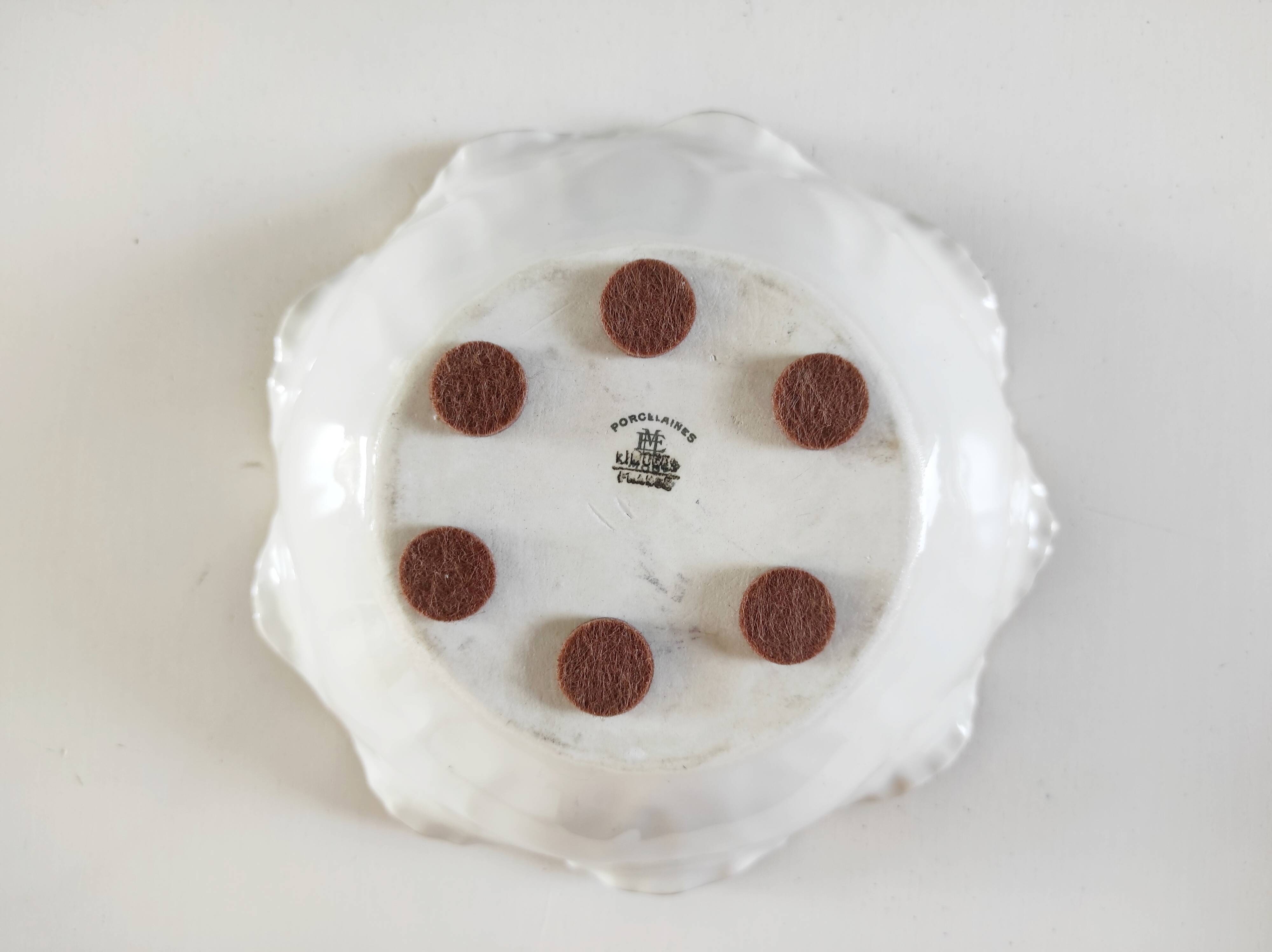 Hand-painted Limoges porcelain bird emptier