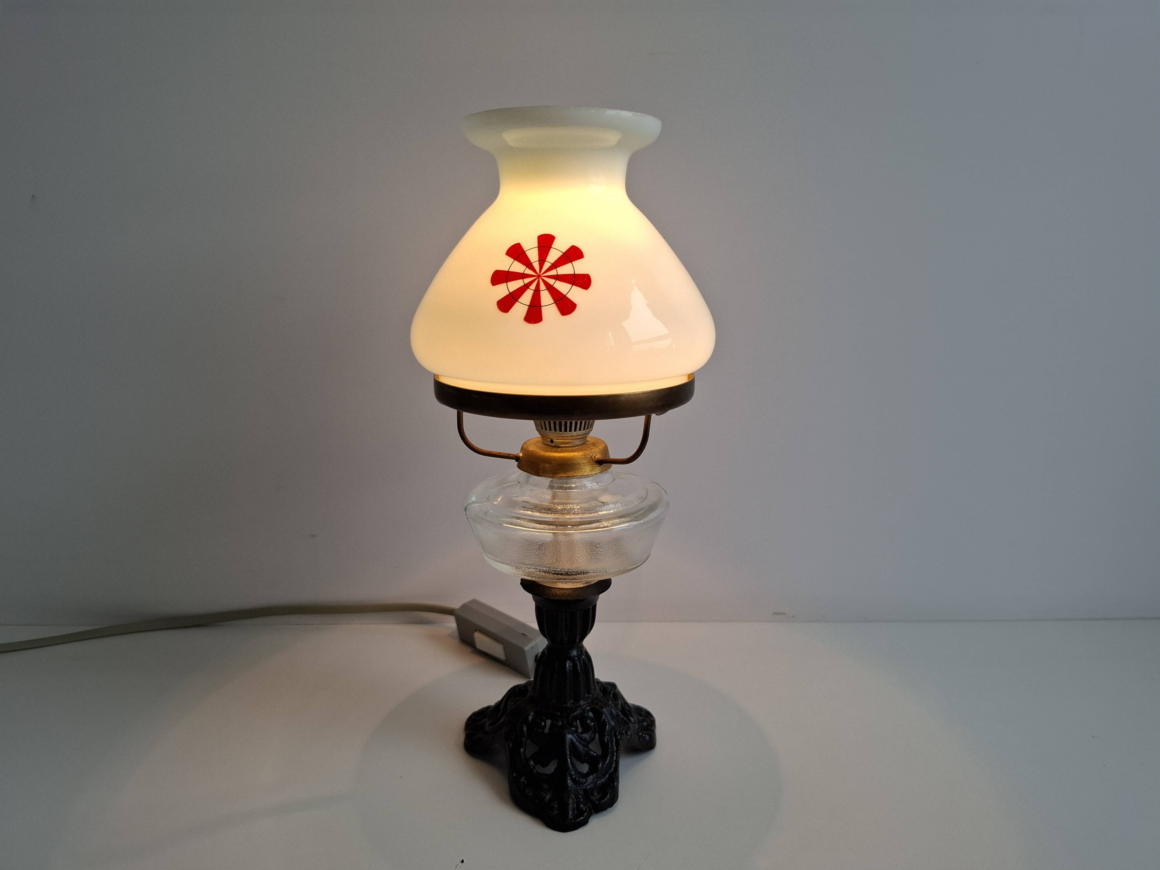 1960s Czechoslovakian milk glass oil lamp style table lamp with red windmill