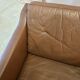 Fauteuil danois en cuir marron à dossier bas 1960