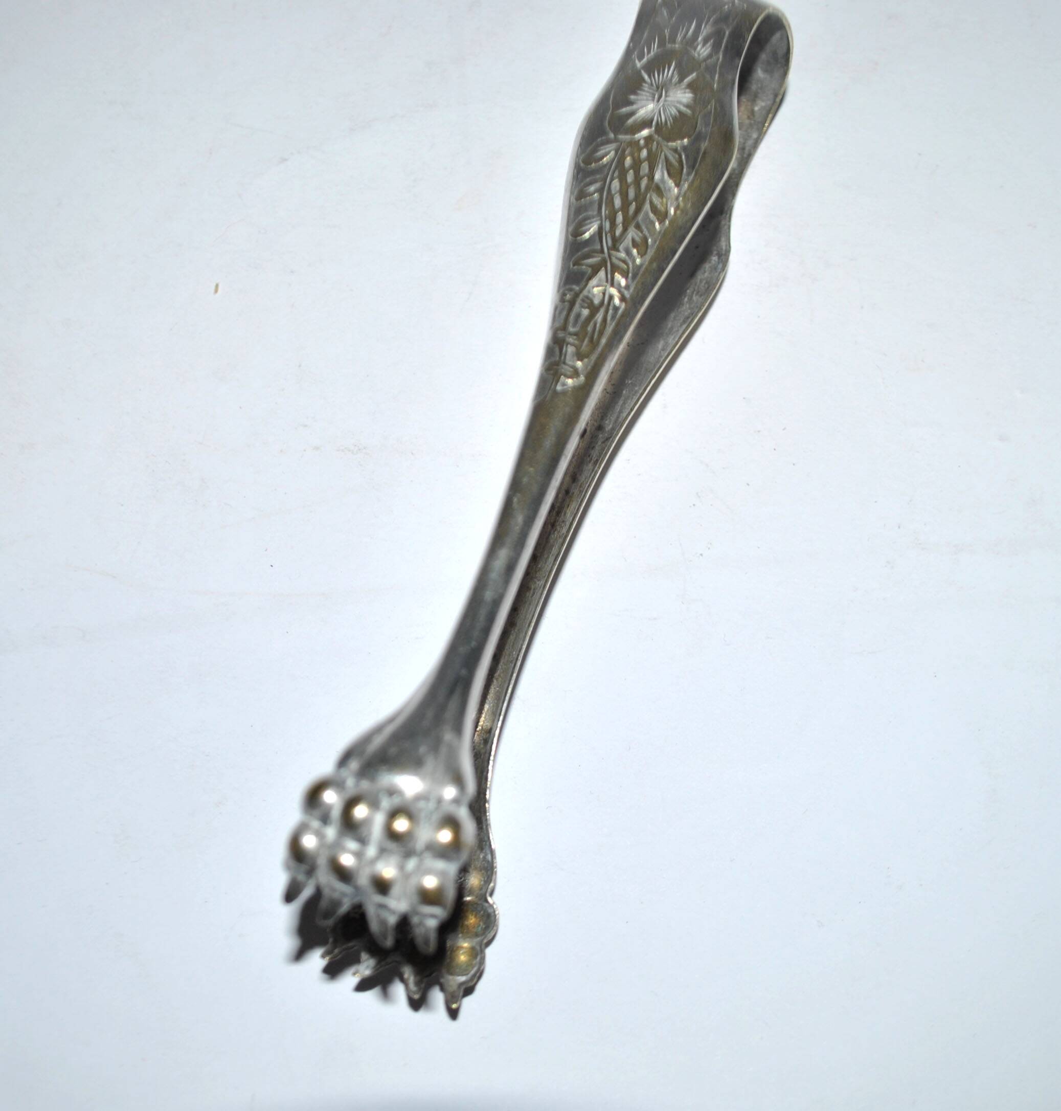 Pince à sucre en métal argenté vintage