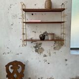 String-type wall shelf