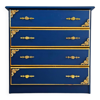 Vintage chest of drawers with gold leaf
