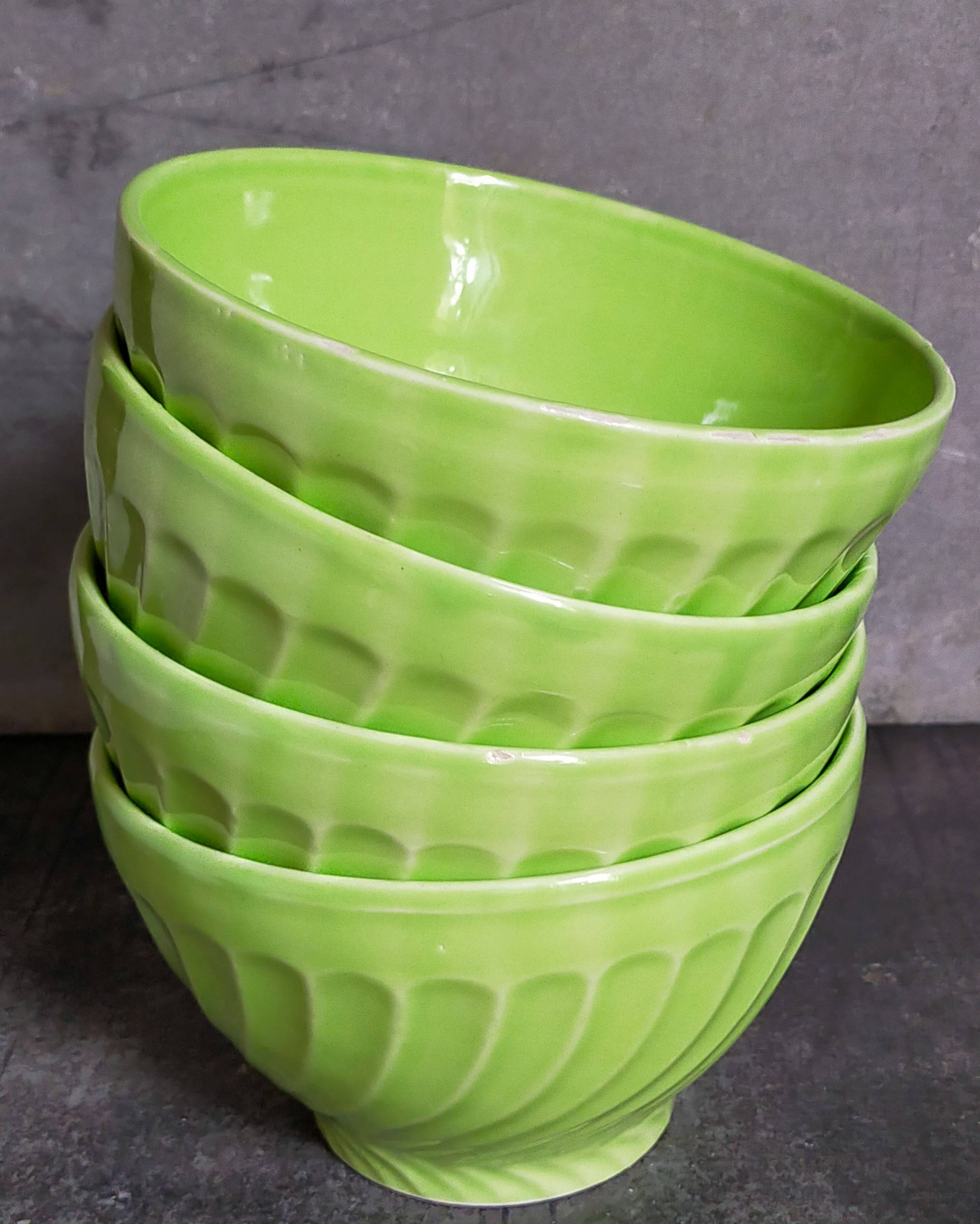 Four vintage spring green earthenware bowls