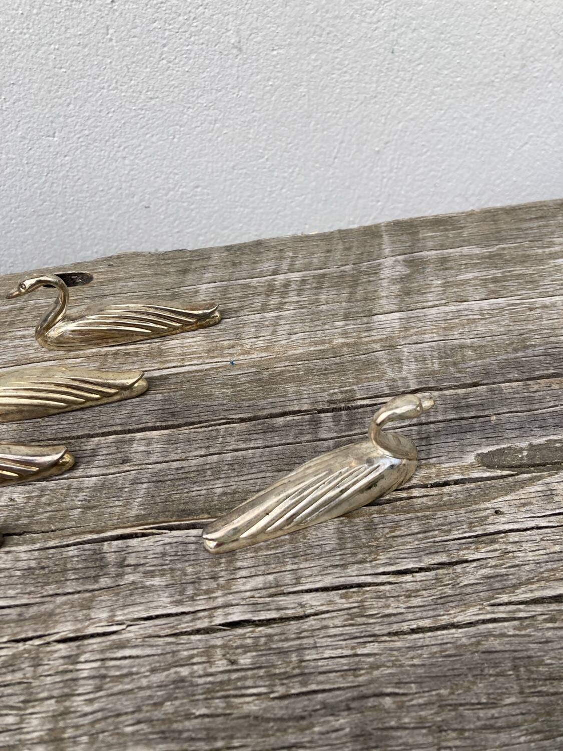 12 duck knife holders in silver metal