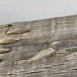 12 duck knife holders in silver metal