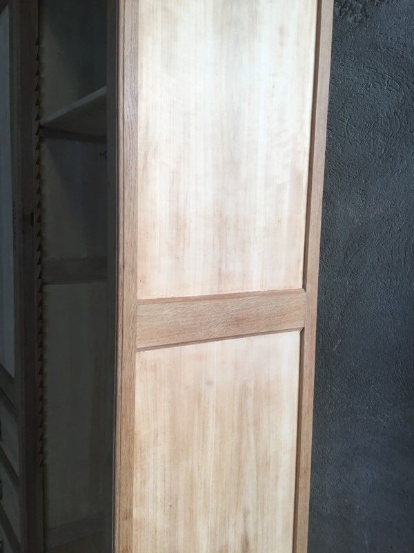 Raw wood hotel cabinet