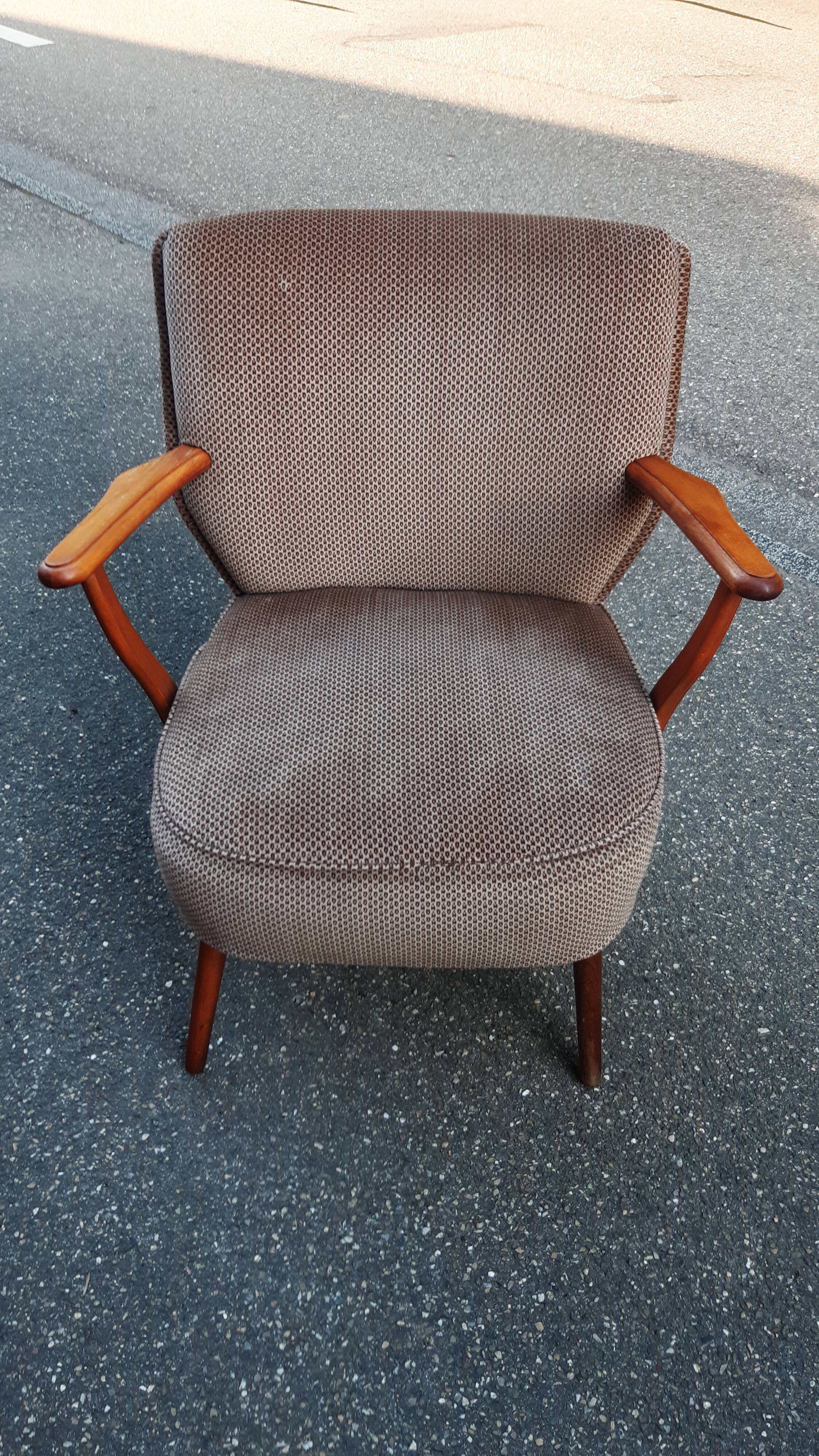 Cocktail armchair with armrests