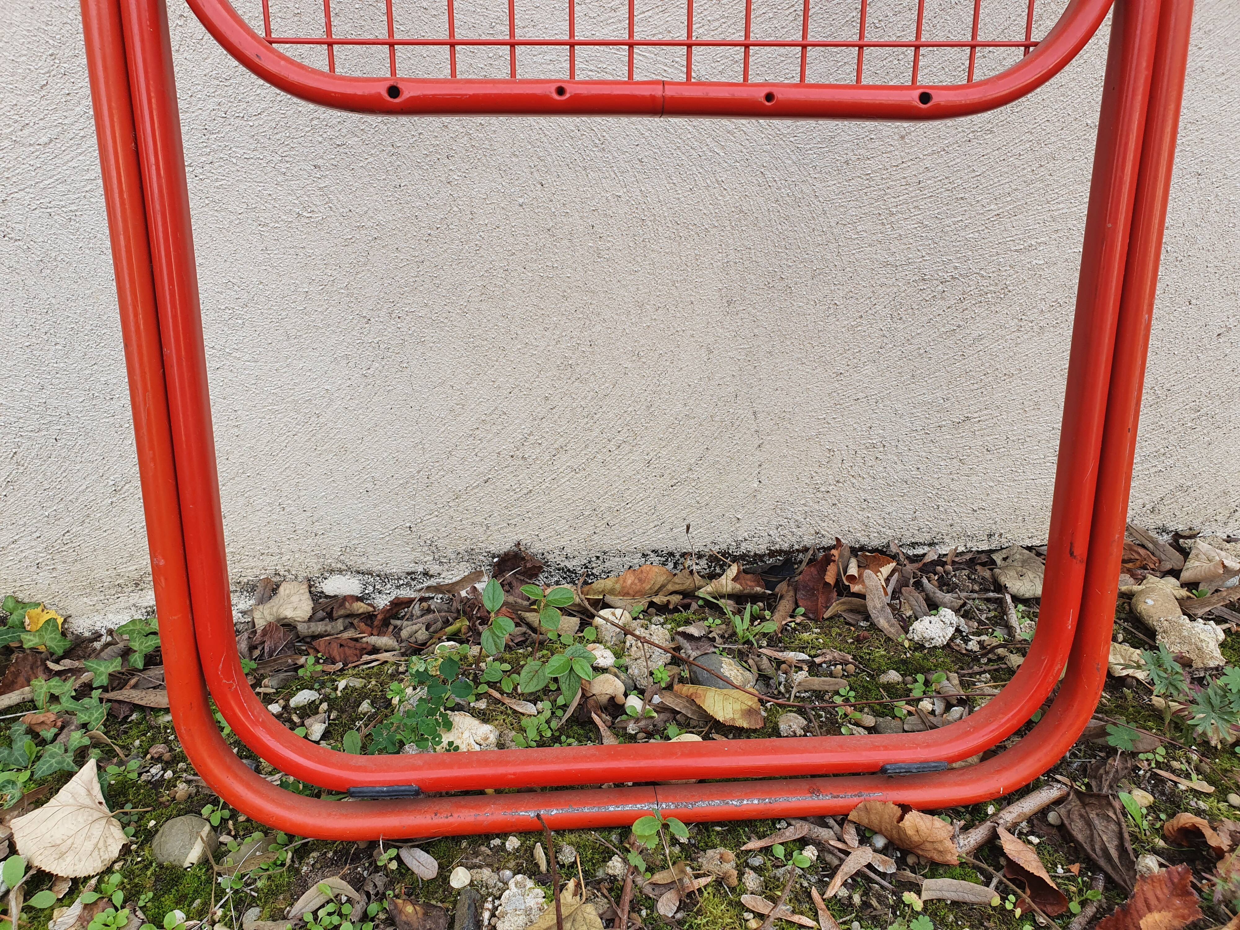 Red mesh folding chair Taulin 80s