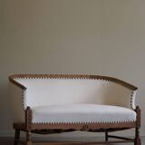 Sculptural 2-seater canapé in oak and wool, Danish "Skønvirke" style, 1920s.