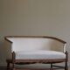 Sculptural 2-seater canapé in oak and wool, Danish "Skønvirke" style, 1920s.