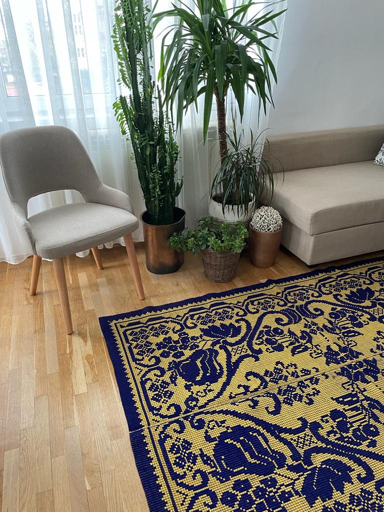 Romanian floral rug handwoven in wool, purple and yellow background