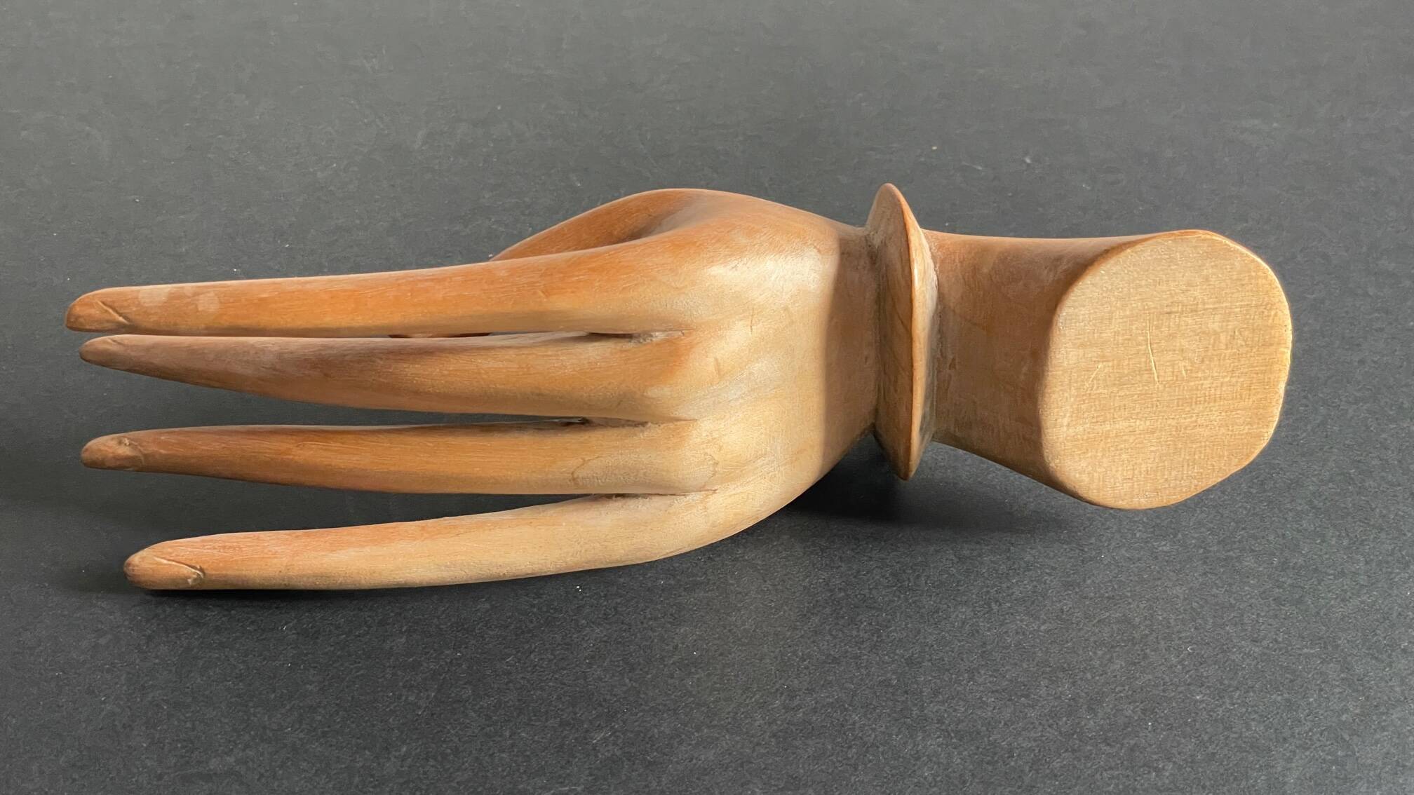 Wooden hand sculpture