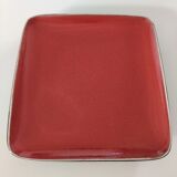 Red water pitcher and assorted plate