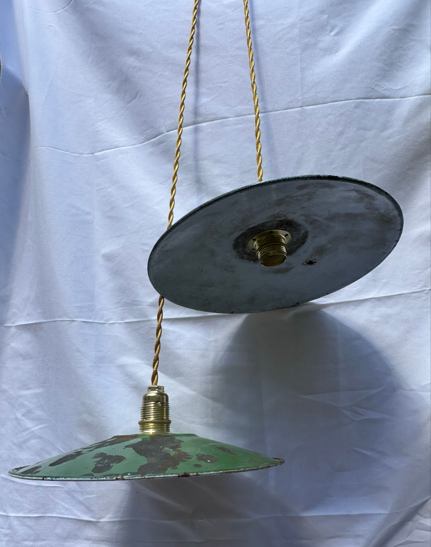 Old suspension pair in green and white enamelled sheet metal.