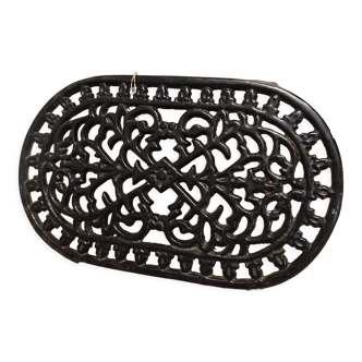 Dessous de plat en fonte ancien