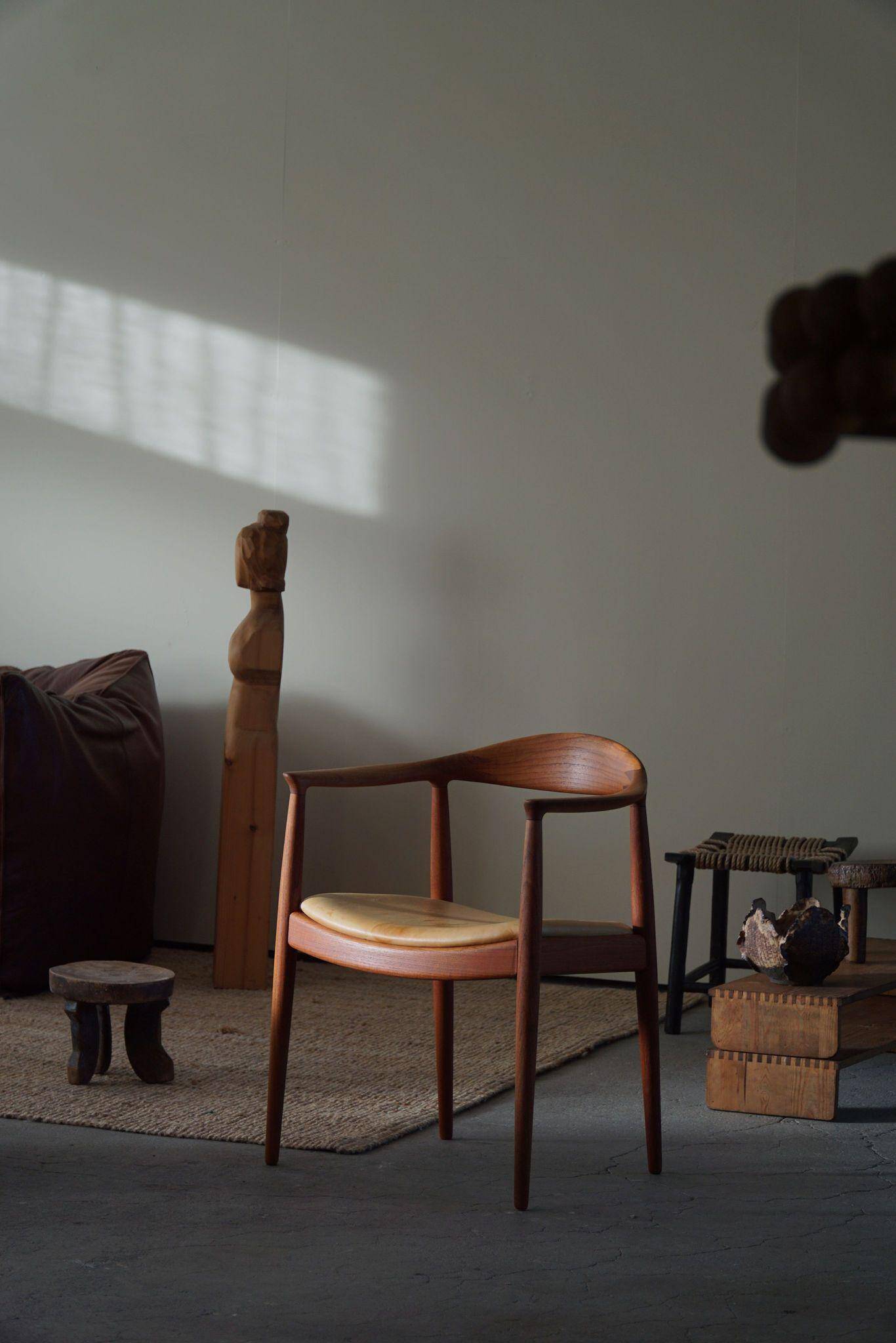 Hans J. Wegner, Teak and leather armchair, model "The Chair" JH501, 1950s