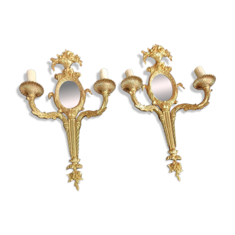 Pair of wall sconces with mirrors. Putti. Bronze. Floral Art Nouveau.