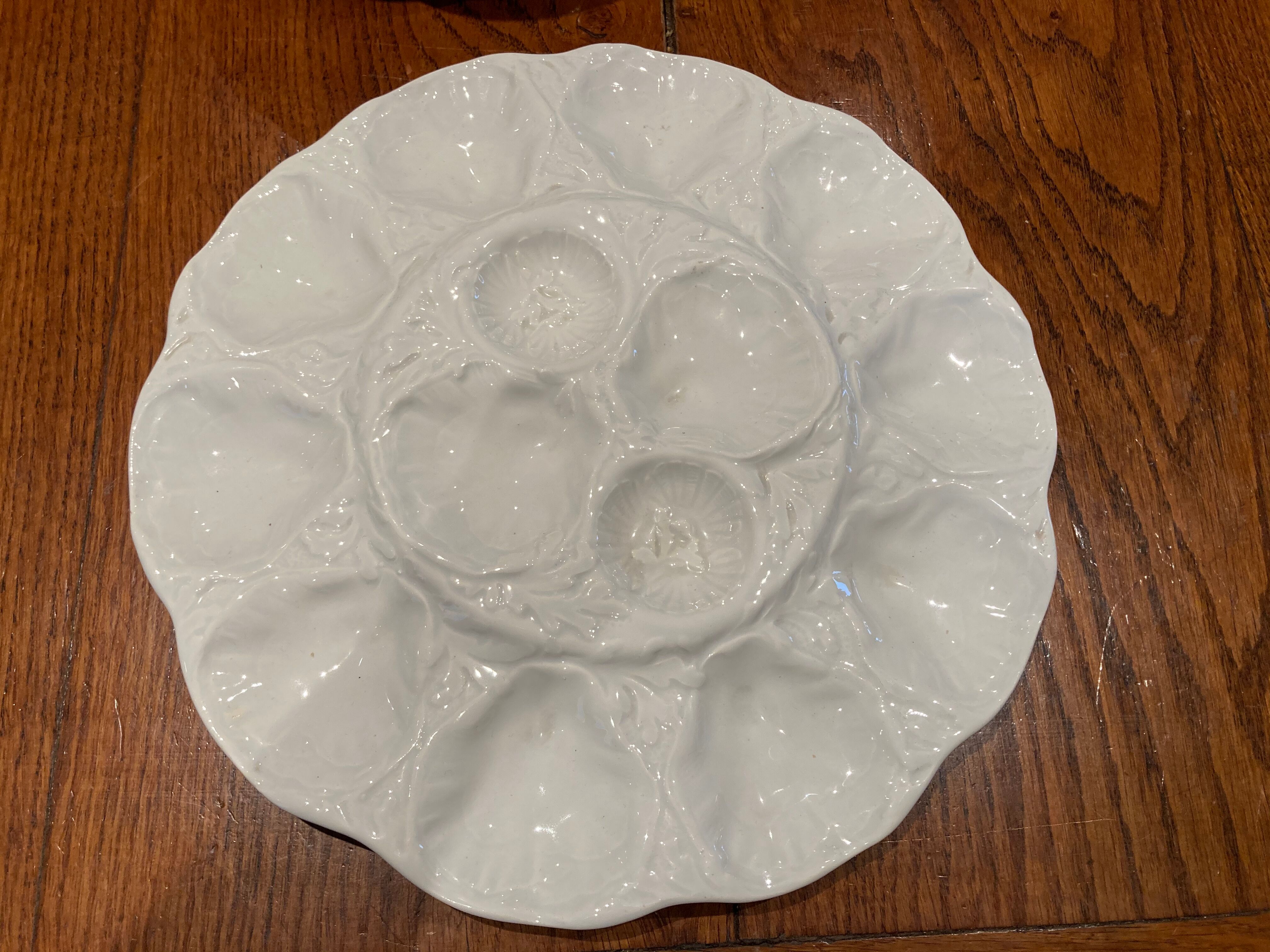 Set of 12 plates and its oyster dish