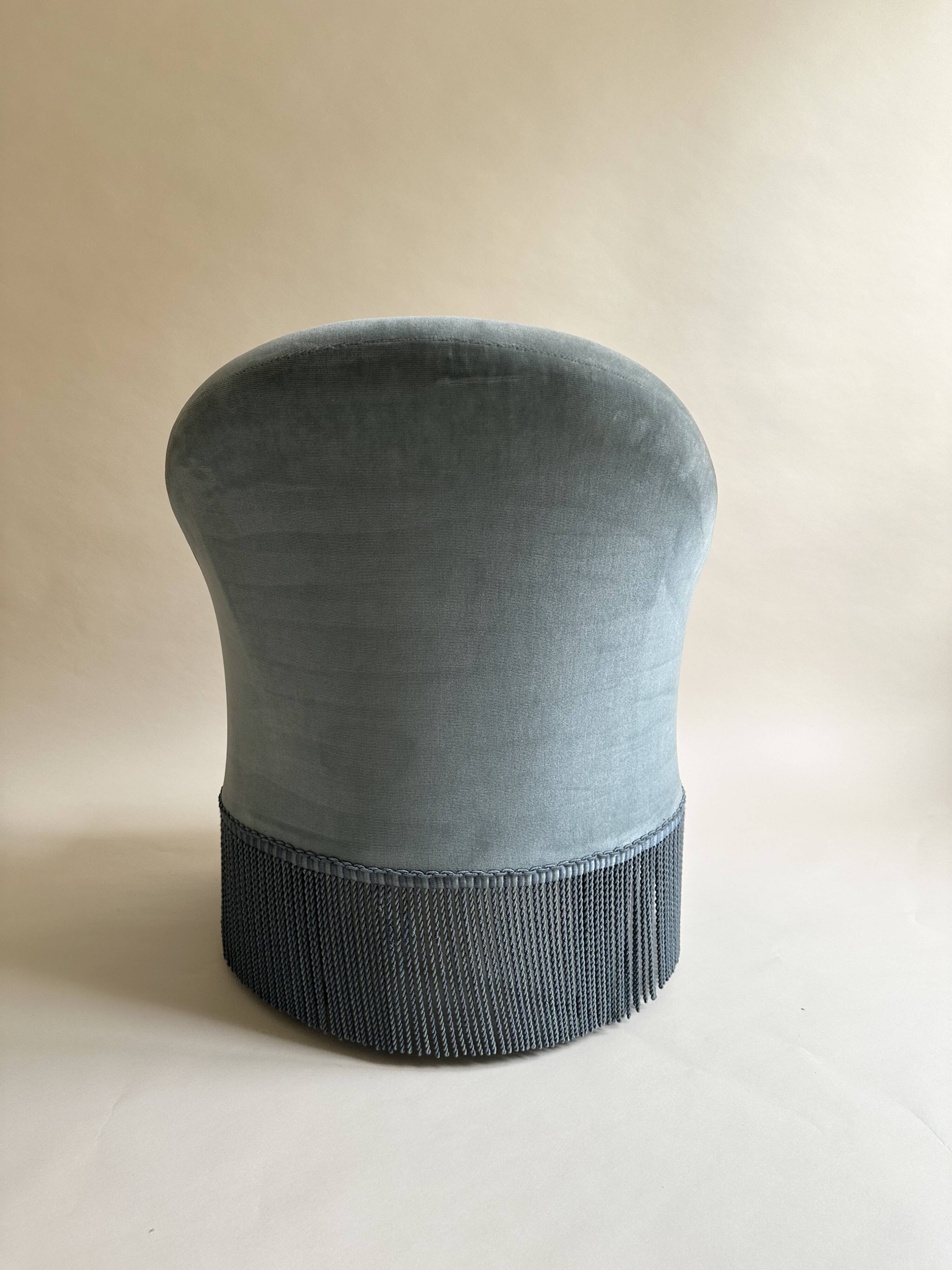 Blue velvet frog armchairs