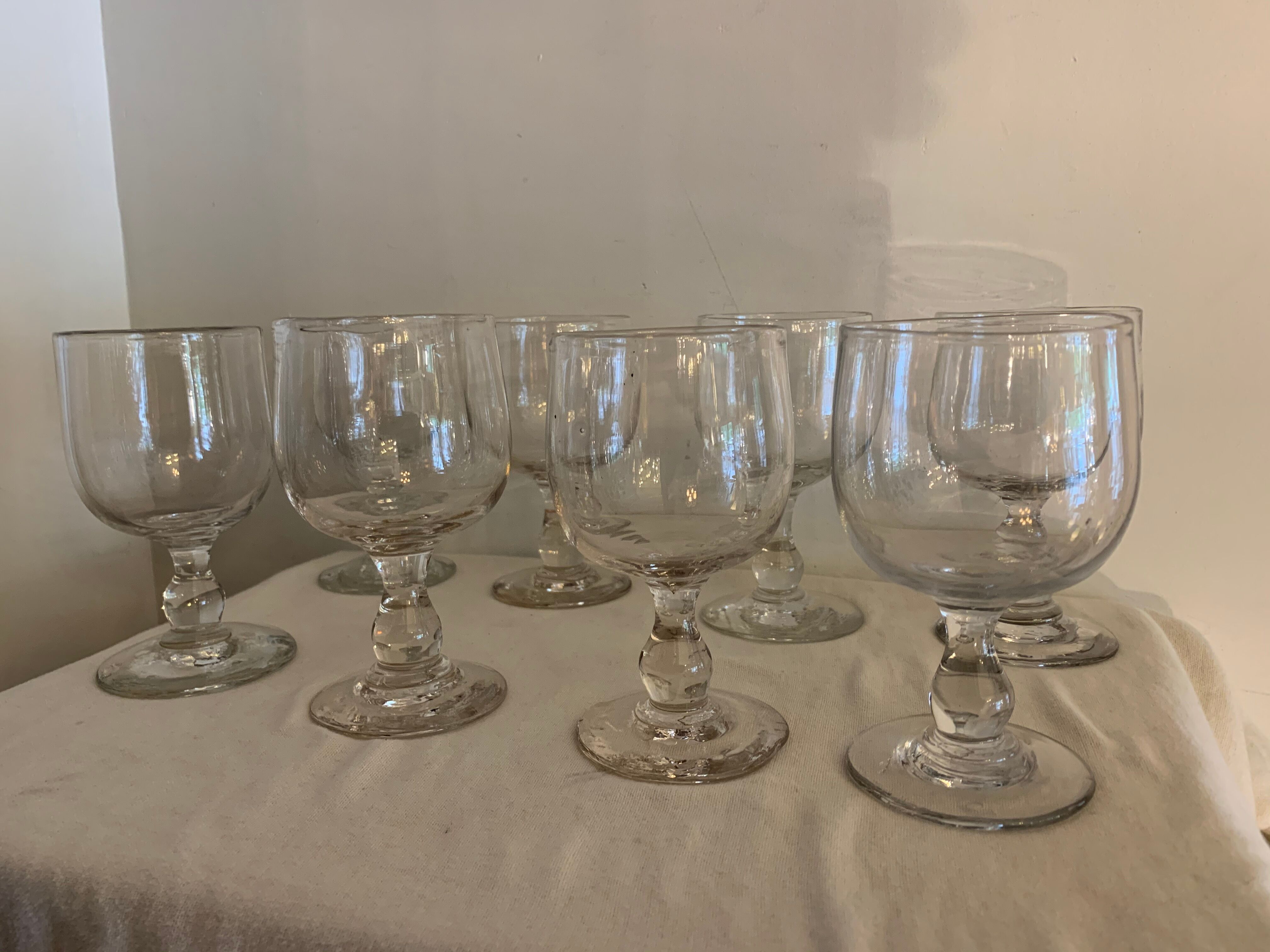 8 old red wine glasses with blown and bubbled glass walk