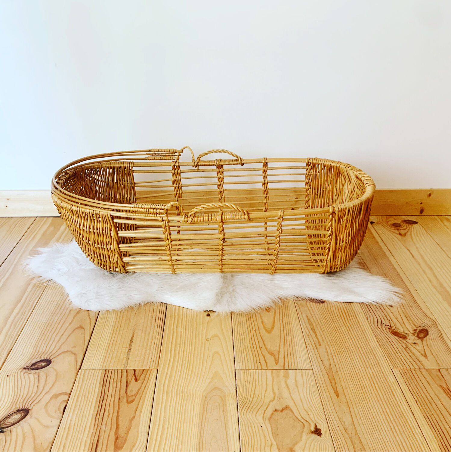 Vintage wicker and rattan bassinet