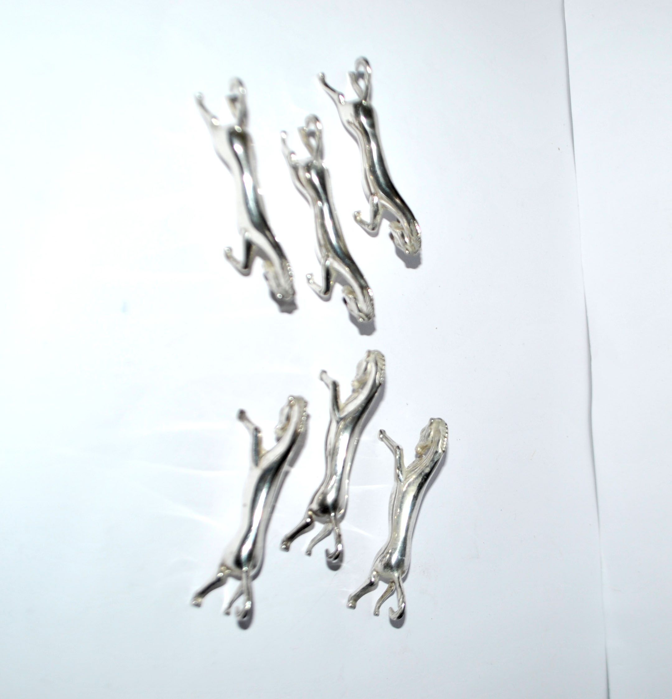 Set of 6 animal-shaped knife rests, modernist horse design in silver-plated metal, equestrian.