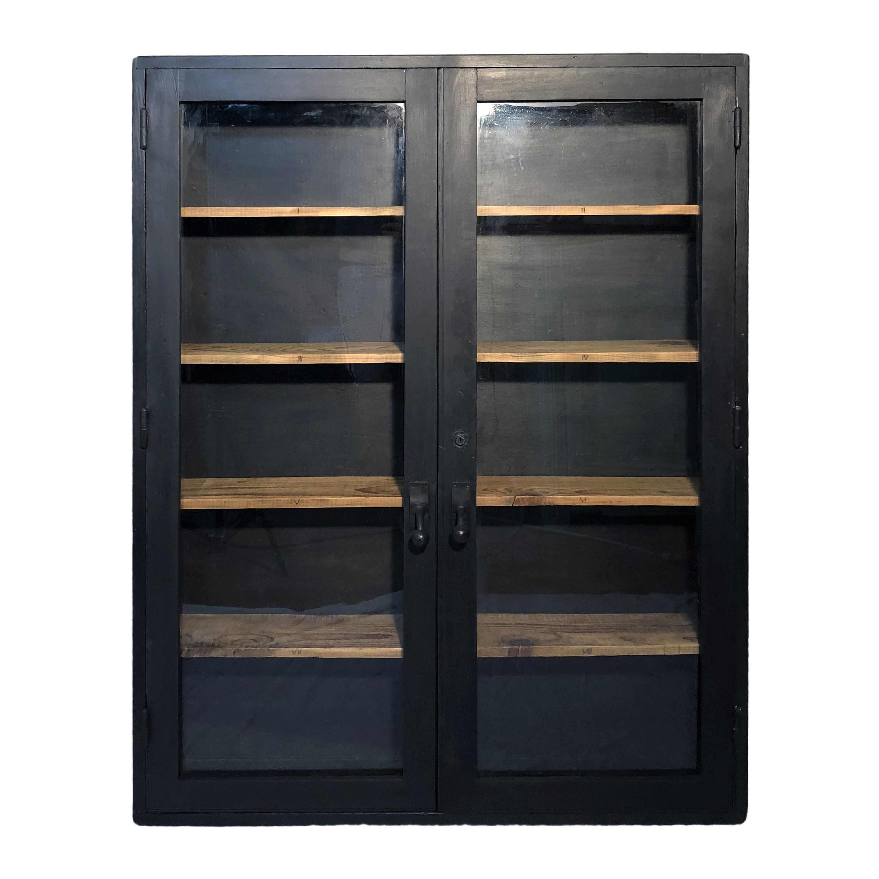 Former black painted wood workshop showcase