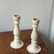 Pair of white wooden candlesticks