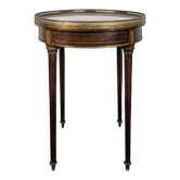 Bouillotte table in mahogany, late 19th century.