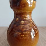 Orange glazed ceramic pitcher