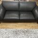 Roche Bobois Réflexion model sofa in taupe leather, 2.5 seats.