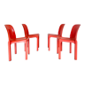 4 orange Selene chairs by Vico Magistretti, Artemide
