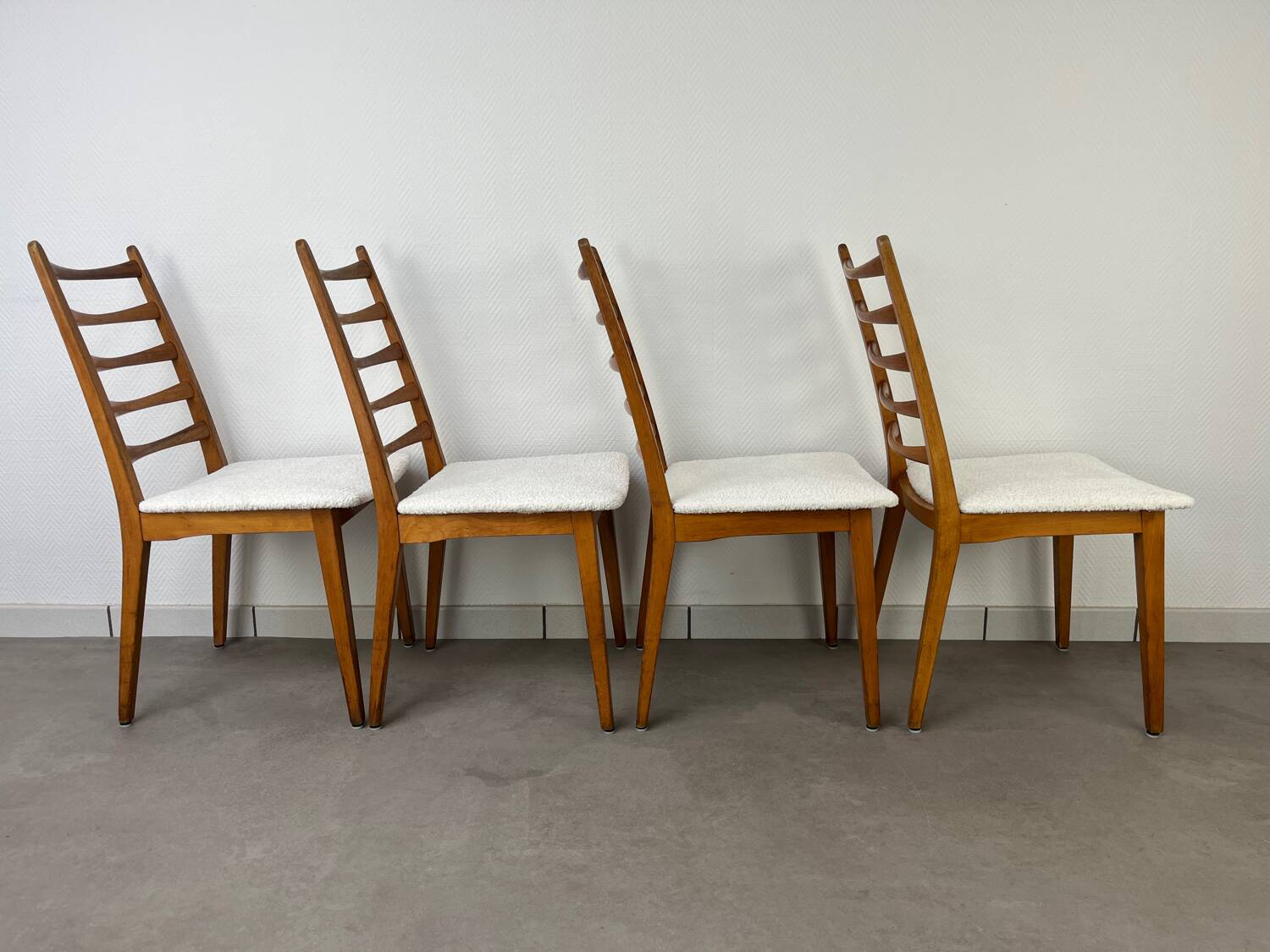 4 Scandinavian chairs, teak with boucle seats.