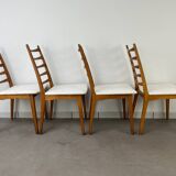 4 Scandinavian chairs, teak with boucle seats.
